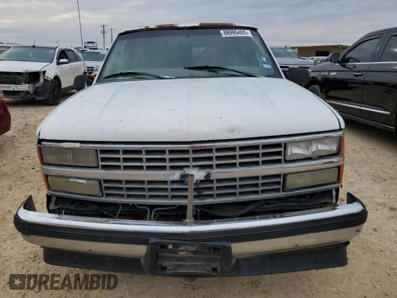 1999 Chevrolet Suburban with VIN 1GNEC16R7XJ418169, listed as a Copart auction lot 88995495 with 2,015,240 mi miles and Salvage title. Bid and sale history available at DreamBid. Image 5.