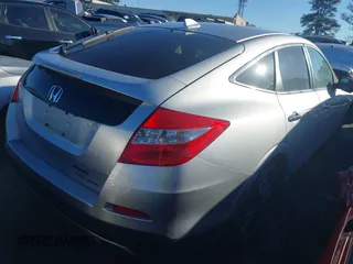 2014 Honda Crosstour EX-L z VIN 5J6TF2H5XEL003186, wystawiony jako IAAI lot #41804813 z przebiegiem 119 982 mil mil oraz . Historia ofert i sprzedaży dostępna na DreamBid. Obrazek 4.