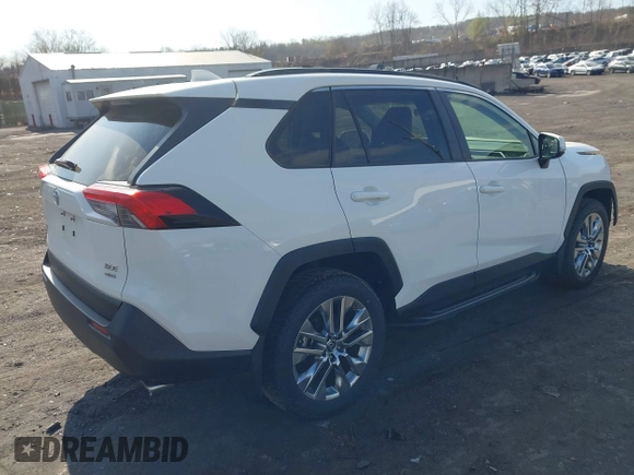 2019 Toyota RAV4 XLE Premium with VIN JTMA1RFV9KD013771, listed as a IAAI auction lot 42055558 with 36,585 mi miles. Bid and sale history available at carsss.com. Image 4.