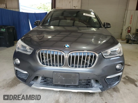 2017 BMW X1 xDrive28i with VIN WBXHT3C34H5F84621, listed as a Copart auction lot 63252115 with 95,170 mi miles and Clean title. Bid and sale history available at DreamBid. Image 5.