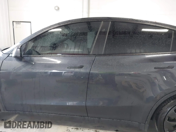2024 Tesla Model Y Performance with VIN 7SAYGDEFXRF049338, listed as a IAAI auction lot 41240812 with 10,132 mi miles and . Bid and sale history available at DreamBid. Image 14.