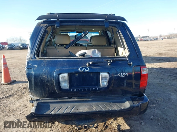 2002 Infiniti QX4 Luxury z VIN JNRDR09Y52W252374, wystawiony jako IAAI lot #41751643 z przebiegiem 183 000 mil mil oraz . Historia ofert i sprzedaży dostępna na DreamBid. Obrazek 17.