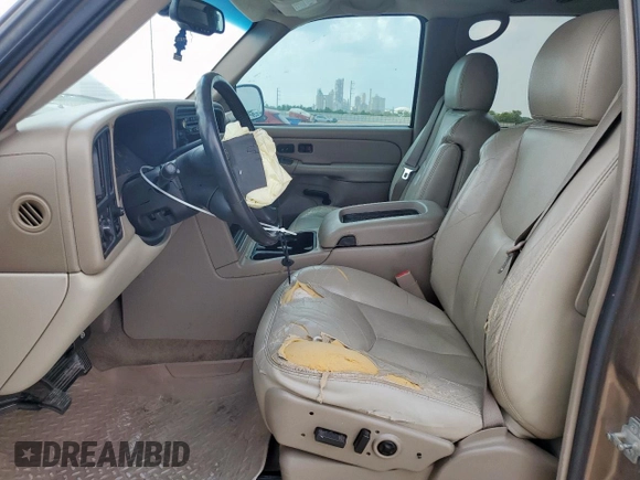 2004 Chevrolet Suburban LT z VIN 1GNEC16Z44R302179, wystawiony jako Copart lot #57956605 z przebiegiem 291 567 mil mil oraz Szkoda całkowita • Salvage title. Historia ofert i sprzedaży dostępna na DreamBid. Obrazek 7.