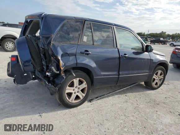 2012 Suzuki Grand Vitara Premium z VIN JS3TD0D29C4100139, wystawiony jako Copart lot #49163115 z przebiegiem 271 080 mil mil oraz Nie do naprawy. Historia ofert i sprzedaży dostępna na DreamBid. Obrazek 3.