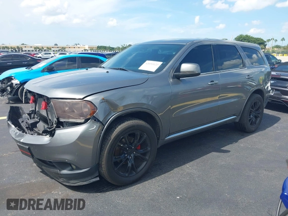 2013 Dodge Durango SXT with VIN 1C4RDHAGXDC500144, listed as a IAAI auction lot 42693122 with 194,519 mi miles and . Bid and sale history available at DreamBid. Image 17.