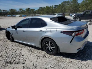 2023 Toyota Camry SE with VIN 4T1G11AK0PU751342, listed as a Copart auction lot 49345515 with 22,887 mi miles and Salvage Title. Bid and sale history available at DreamBid. Image 2.