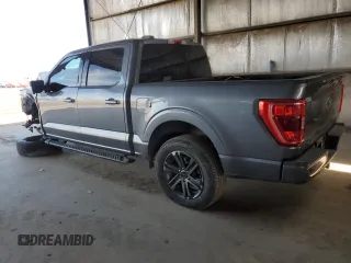 2021 Ford F-150 XL with VIN 1FTEW1C58MFB54623, listed as a Copart auction lot 55072405 with 115,374 mi miles and Salvage title. Bid and sale history available at DreamBid. Image 2.
