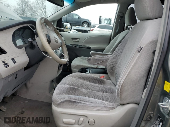 2011 Toyota Sienna LE AAS with VIN 5TDKK3DC4BS087295, listed as a Copart auction lot 50319335 with 148,279 mi miles and Salvage Title. Bid and sale history available at carsss.com. Image 7.