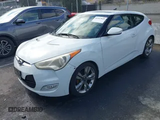 2012 Hyundai Veloster w/Gray Int с VIN KMHTC6ADXCU027658, выставлен на аукционе IAAI как лот 41517929 с пробегом 142 884 миль миль и . История ставок и продаж доступна на DreamBid. Изображение 2.