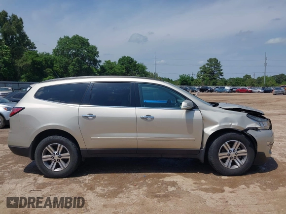 2015 Chevrolet Traverse LT z VIN 1GNKRHKD7FJ109076, wystawiony jako IAAI lot #42032817 z przebiegiem 62 830 mil mil oraz . Historia ofert i sprzedaży dostępna na DreamBid. Obrazek 13.