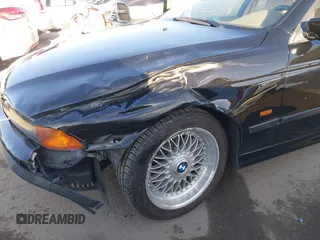 2000 BMW 5 Series 528iA with VIN WBADM6343YGU12629, listed as a IAAI auction lot 41963814 with 206,922 mi miles. Bid and sale history available at carsss.com. Image 6.