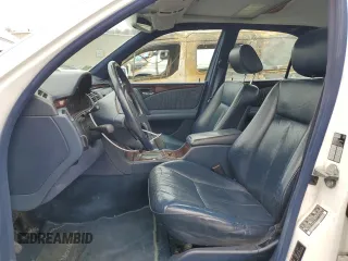 1996 Mercedes-Benz E-Class with VIN WDBJF55F5TJ022277, listed as a Copart auction lot 52597985 with 213,848 mi miles and Clean Title. Bid and sale history available at carsss.com. Image 7.
