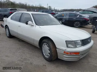1996 Lexus LS 400 with VIN JT8BH22F8T0039047, listed as a IAAI auction lot 41883243 with 185,921 mi miles. Bid and sale history available at carsss.com. Image 1.