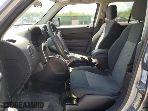 2014 Jeep Patriot Sport with VIN 1C4NJRBB0ED847977, listed as a Copart auction lot 55670985 with 98,042 mi miles and Salvage Title. Bid and sale history available at DreamBid. Image 7.