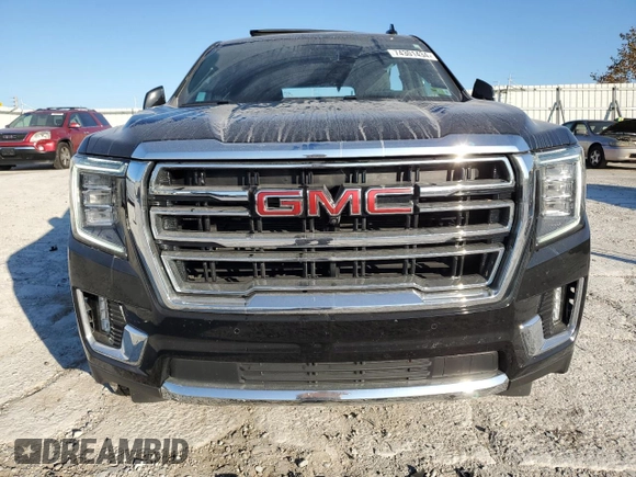 2021 GMC Yukon SLT with VIN 1GKS2BKD5MR171976, listed as a Copart auction lot 74301434 with 82,243 mi miles and Non Repairable. Bid and sale history available at carsss.com. Image 5.