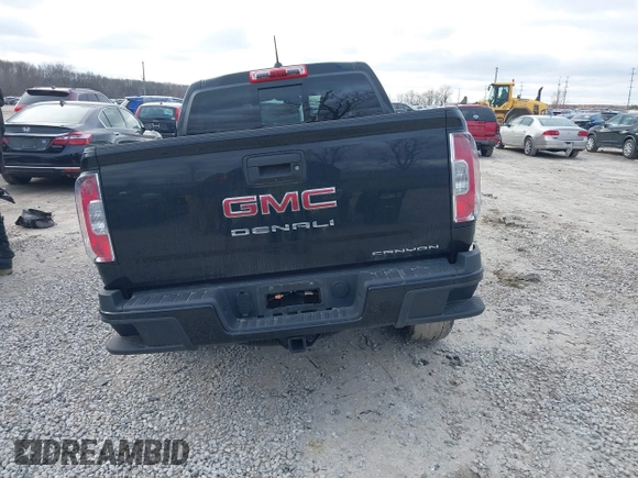 2021 GMC Canyon 4WD Denali with VIN 1GTG6EEN9M1221529, listed as a IAAI auction lot 41228498 with 67,727 mi miles. Bid and sale history available at carsss.com. Image 16.