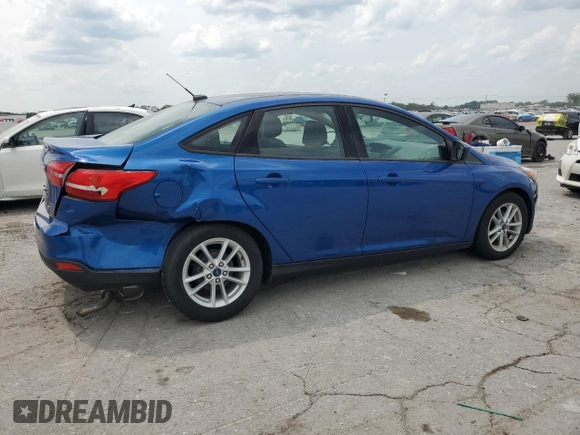 2018 Ford Focus SE with VIN 1FADP3F23JL214428, listed as a Copart auction lot 60552465 with 33,699 mi miles and Salvage title. Bid and sale history available at DreamBid. Image 4.