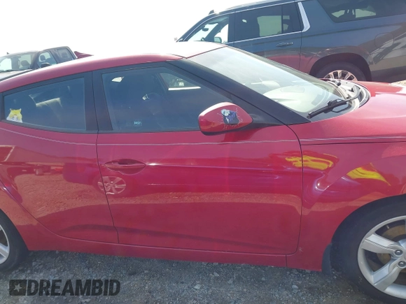 2013 Hyundai Veloster w/Gray Int with VIN KMHTC6AD8DU112810, listed as a IAAI auction lot 42144625 with 142,524 mi miles and . Bid and sale history available at DreamBid. Image 13.