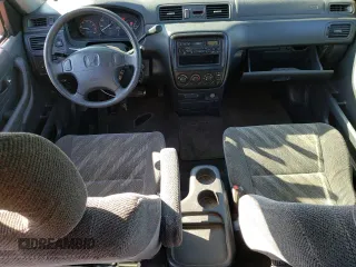 2000 Honda CR-V LX with VIN JHLRD1843YC063597, listed as a Copart auction lot 77765884 with 310,685 mi miles and Salvage Title. Bid and sale history available at carsss.com. Image 8.