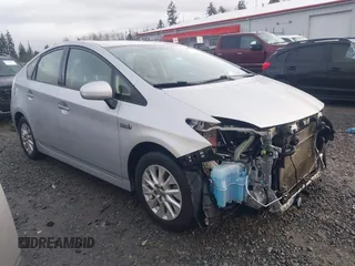 2014 Toyota Prius z VIN JTDKN3DP9E3050355, wystawiony jako IAAI lot #41466072 z przebiegiem 106 309 mil mil oraz . Historia ofert i sprzedaży dostępna na DreamBid. Obrazek 1.
