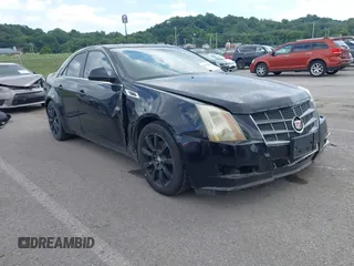 2009 Cadillac CTS AWD with VIN 1G6DT57V090131727, listed as a IAAI auction lot 42628542 with Not provided miles and . Bid and sale history available at DreamBid. Image 1.