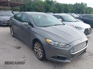 2013 Ford Fusion Titanium with VIN 3FA6P0D94DR207310, listed as a IAAI auction lot 42427727 with 235,510 mi miles and . Bid and sale history available at DreamBid. Image 1.