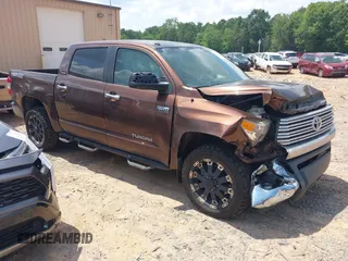 2014 Toyota Tundra Limited with VIN 5TFHW5F19EX400636, listed as a IAAI auction lot 42626818 with 267,402 mi miles and . Bid and sale history available at DreamBid. Image 1.