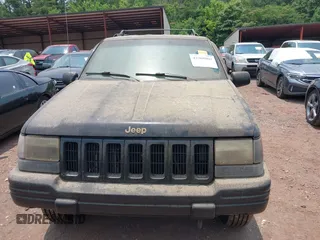 1996 Jeep Grand Cherokee Limited with VIN 1J4GZ78Y9TC351364, listed as a IAAI auction lot 42368001 with 254,634 mi miles and . Bid and sale history available at DreamBid. Image 6.