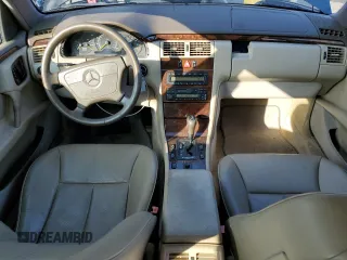 1997 Mercedes-Benz E 320 with VIN WDBJF55FXVA430115, listed as a Copart auction lot 43053715 with 158,057 mi miles and Clean Title. Bid and sale history available at DreamBid. Image 8.