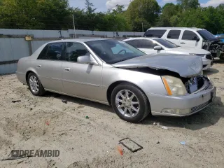 2009 Cadillac DTS 1SA z VIN 1G6KD57Y69U114700, wystawiony jako Copart lot #56007485 z przebiegiem 158 849 mil mil oraz Szkody całkowita. Historia ofert i sprzedaży dostępna na DreamBid. Obrazek 4.