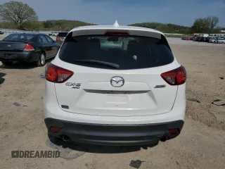 2015 Mazda CX-5 Grand Touring with VIN JM3KE4DY3F0496994, listed as a Copart auction lot 56093965 with 184,256 mi miles and Non Repairable. Bid and sale history available at DreamBid. Image 6.