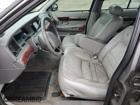 2000 Mercury Grand Marquis LS z VIN 2MEFM75WXYX742065, wystawiony jako Copart lot #57655795 z przebiegiem 175 070 mil mil oraz Tytuł czysty. Historia ofert i sprzedaży dostępna na DreamBid. Obrazek 7.