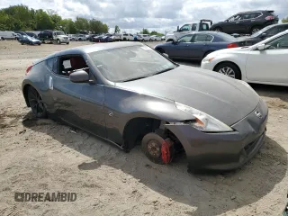 2010 Nissan 370Z Touring z VIN JN1AZ4EH6AM502380, wystawiony jako Copart lot #54293755 z przebiegiem Nie podano mil oraz Nie do naprawy • Non repairable. Historia ofert i sprzedaży dostępna na DreamBid. Obrazek 4.