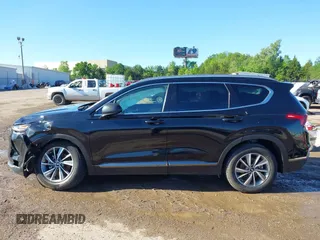 2019 Hyundai Santa Fe SEL Plus z VIN 5NMS33AD9KH035402, wystawiony jako IAAI lot #42162086 z przebiegiem 108 827 mil mil oraz . Historia ofert i sprzedaży dostępna na DreamBid. Obrazek 14.