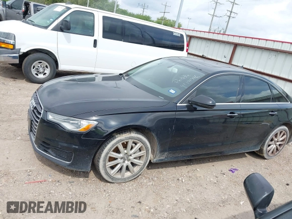 2016 Audi A6 2.0T Premium Plus with VIN WAUGFAFC1GN012799, listed as a IAAI auction lot 42141346 with 101,506 mi miles. Bid and sale history available at carsss.com. Image 14.