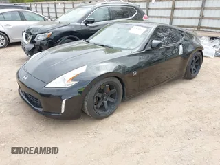2016 Nissan 370Z with VIN JN1AZ4EHXGM935774, listed as a IAAI auction lot 41976743 with 66,979 mi miles. Bid and sale history available at carsss.com. Image 2.
