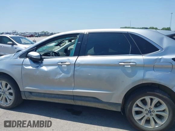 2022 Ford Edge Titanium with VIN 2FMPK4K96NBA41746, listed as a IAAI auction lot 42551594 with 86,730 mi miles and . Bid and sale history available at DreamBid. Image 14.