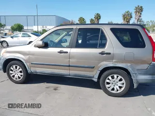 2005 Honda CR-V EX with VIN JHLRD78895C026877, listed as a IAAI auction lot 42129376 with 164,543 mi miles. Bid and sale history available at carsss.com. Image 6.