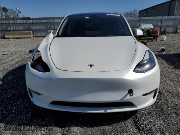 2023 Tesla Model Y Performance with VIN 7SAYGDEF4PF665873, listed as a Copart auction lot 49620705 with 39,239 mi miles and Salvage Title. Bid and sale history available at DreamBid. Image 5.