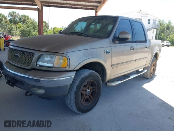 2002 Ford F-150 XLT with VIN 1FTRW08LX2KE43025, listed as a IAAI auction lot 42060641 with 123,507 mi miles. Bid and sale history available at carsss.com. Image 2.