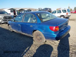 2002 Saturn SL z VIN 1G8ZF52802Z134506, wystawiony jako IAAI lot #41461865 z przebiegiem 210 886 mil mil oraz . Historia ofert i sprzedaży dostępna na DreamBid. Obrazek 3.