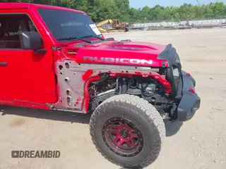 2022 Jeep Wrangler Unlimited Rubicon with VIN 1C4HJXFG0NW100620, listed as a IAAI auction lot 42534993 with 21,614 mi miles and . Bid and sale history available at DreamBid. Image 6.