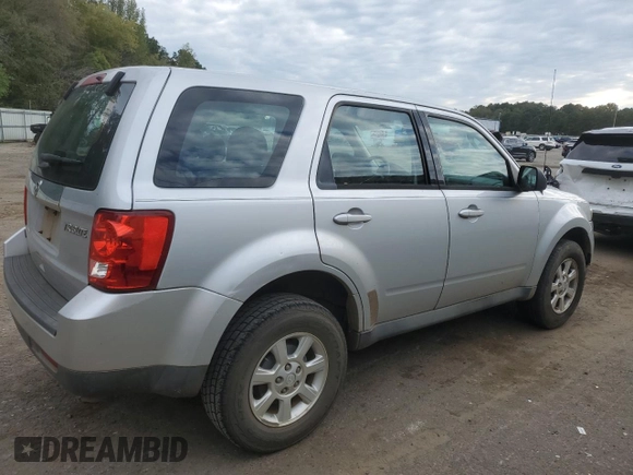 2011 Mazda Tribute Touring with VIN 4F2CY0C70BKM06723, listed as a Copart auction lot 80783624 with 218,372 mi miles and Salvage Title. Bid and sale history available at carsss.com. Image 3.