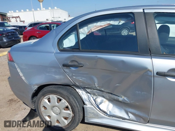 2010 Mitsubishi Lancer DE with VIN JA32U1FU4AU015574, listed as a IAAI auction lot 41770332 with 125,458 mi miles. Bid and sale history available at carsss.com. Image 6.