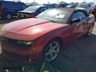 2014 Chevrolet Camaro LT with VIN 2G1FB3D39E9145988, listed as a IAAI auction lot 40028454 with 129,227 mi miles. Bid and sale history available at carsss.com. Image 2.