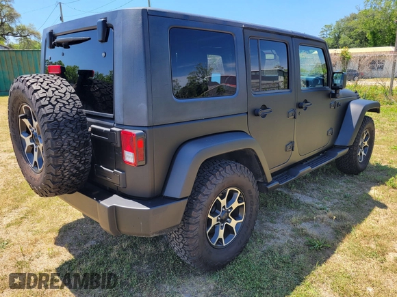 2014 Jeep Wrangler Unlimited Sport with VIN 1C4HJWDG4EL159619, listed as a IAAI auction lot 42176313 with 79,715 mi miles and . Bid and sale history available at DreamBid. Image 4.