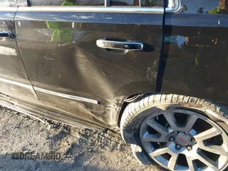 2016 GMC Yukon Denali with VIN 1GKS2CKJ2GR412201, listed as a IAAI auction lot 41185716 with 124,421 mi miles. Bid and sale history available at carsss.com. Image 20.