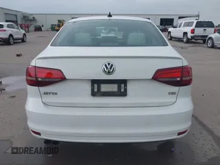 2016 Volkswagen Jetta Sport z VIN 3VWD17AJ1GM334234, wystawiony jako IAAI lot #42299618 z przebiegiem 86 143 mil mil oraz . Historia ofert i sprzedaży dostępna na DreamBid. Obrazek 16.
