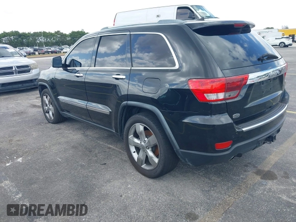 2012 Jeep Grand Cherokee Overland with VIN 1C4RJECT4CC299549, listed as a IAAI auction lot 41917306 with 229,256 mi miles. Bid and sale history available at carsss.com. Image 3.