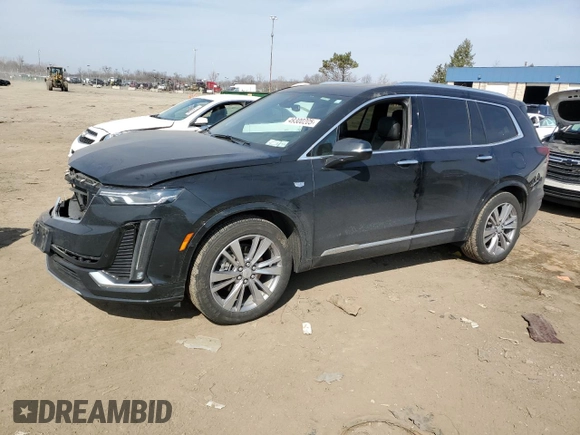 2023 Cadillac XT6 FWD Premium Luxury with VIN 1GYKPCRS4PZ103061, listed as a Copart auction lot 49300205 with 72,131 mi miles and Salvage title. Bid and sale history available at DreamBid. Image 1.